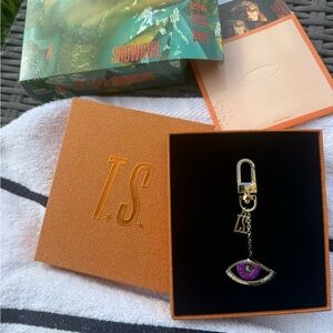 Taylor Swift Gold Eye Charm Keychain with Purple Accent